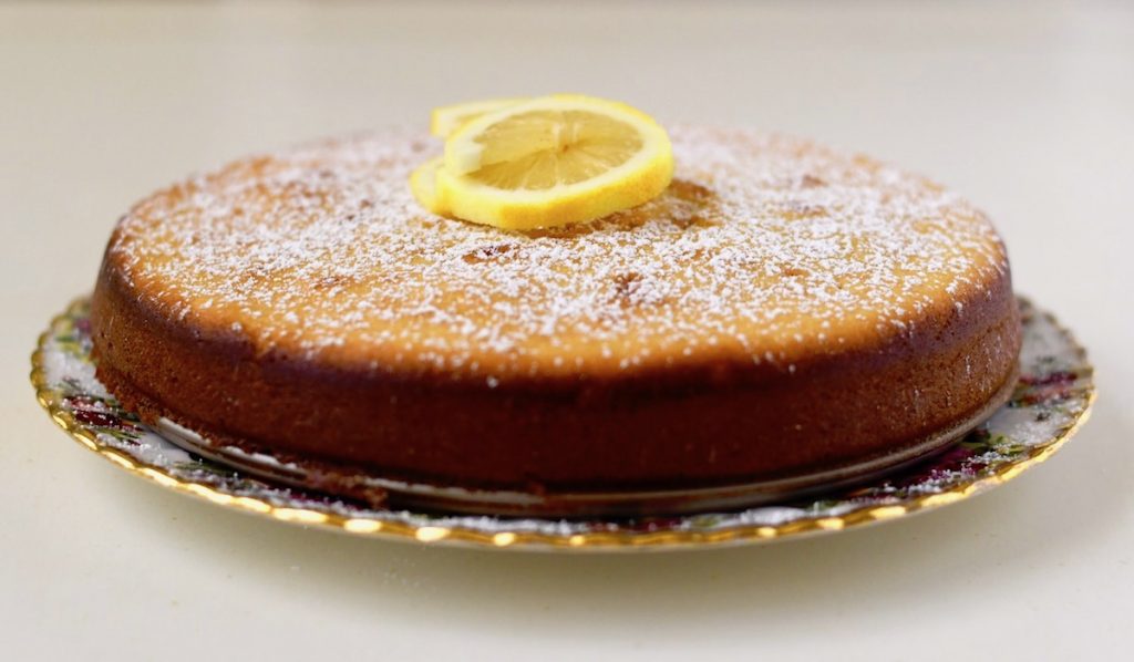 Lemon Ricotta Cake dusted with powdered sugar.