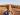 wellness travel: woman hiking in fall