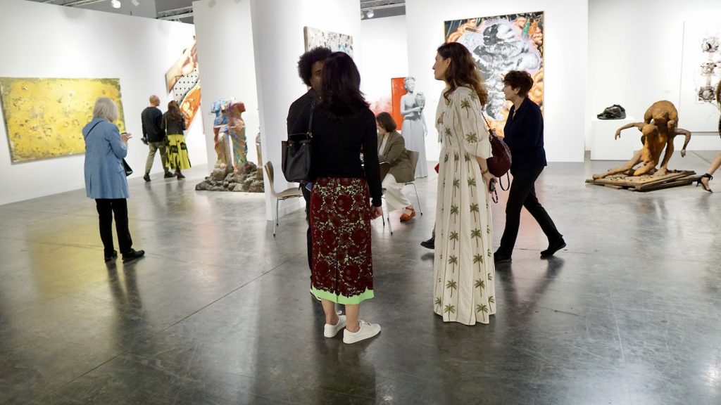 Global art market 2025 and Miami Art Week visitors. Collectors and galleries discuss art fair strategies, logistics, and shifting international participation.